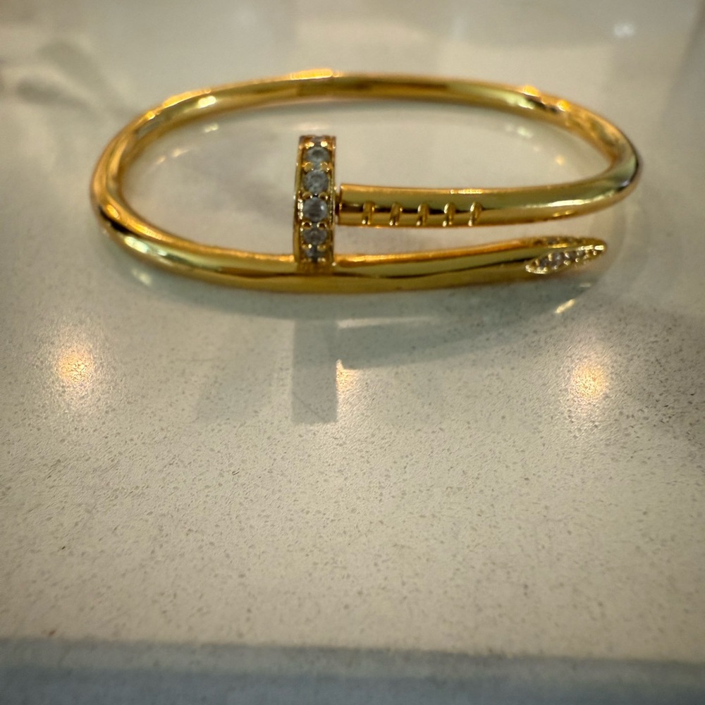 Elegant Gold Nail Bracelet